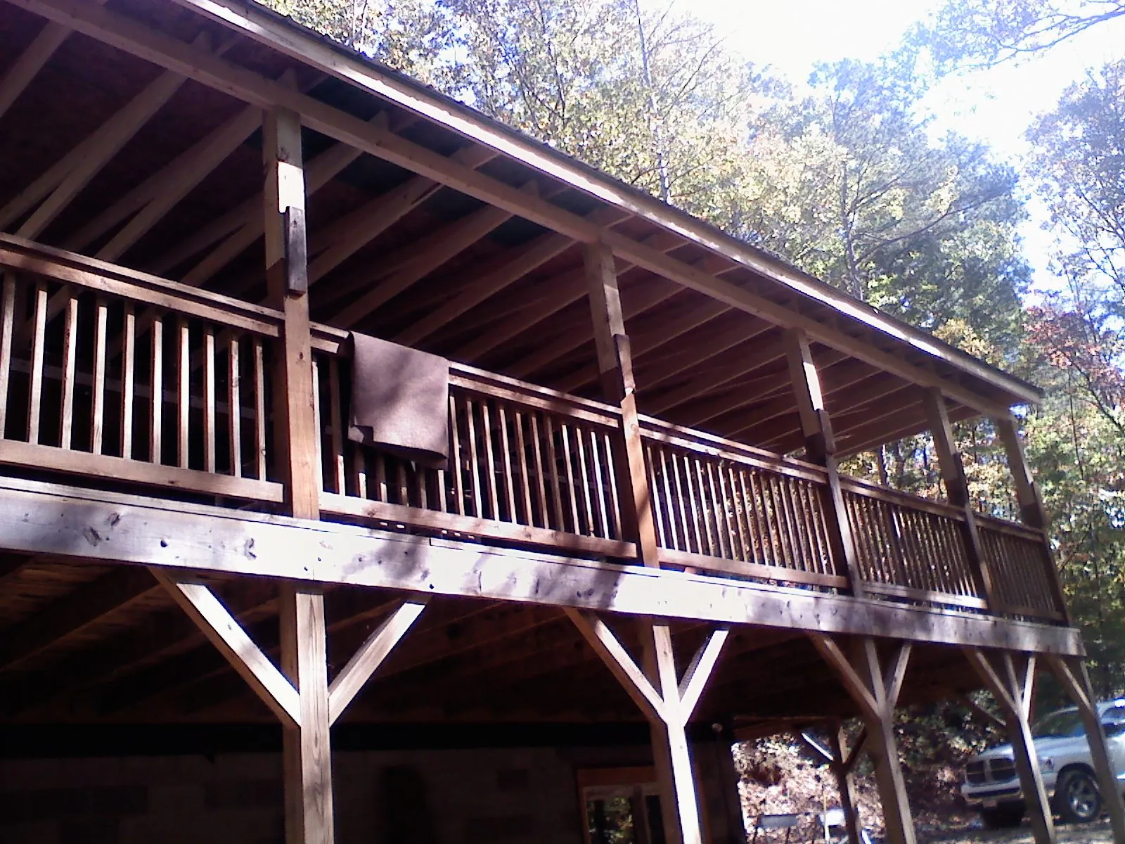 Timber framing under a new elevated porch and deck — Roof Leak Repair in Fall River by Roofing Brothers